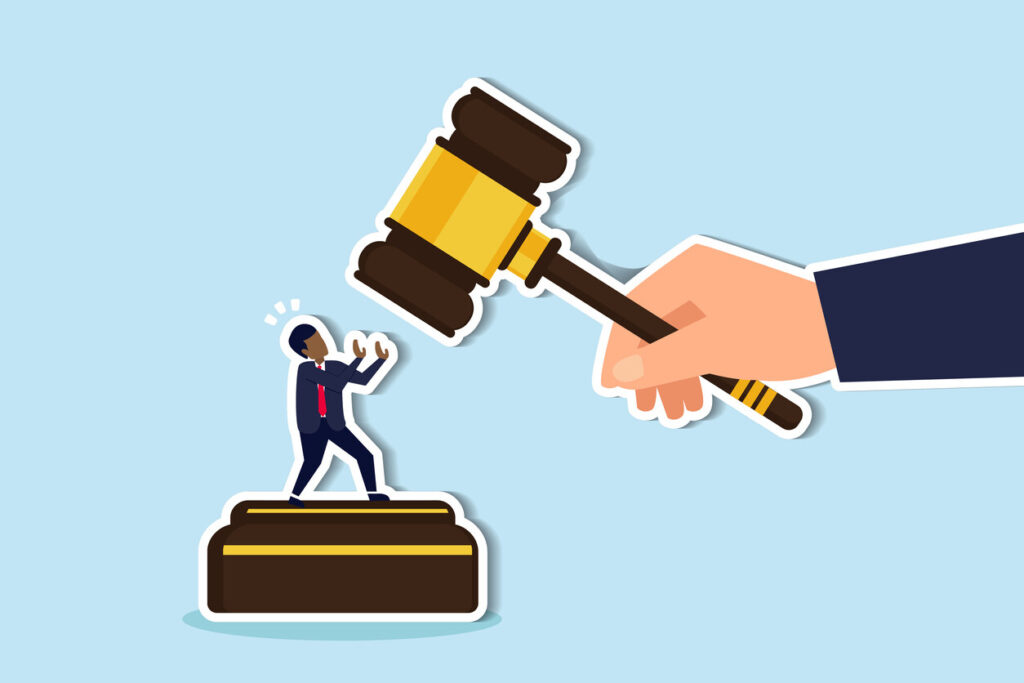 A large hand with a judge's gavel is poised over a small, recoiling public employee figure, symbolizing the severe career impact of domestic violence allegations on public employees in Michigan.